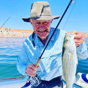 Fly fishing at Lake Powell May 2022. Can you say “fish on” with Ambassador Guides & Outfitters.